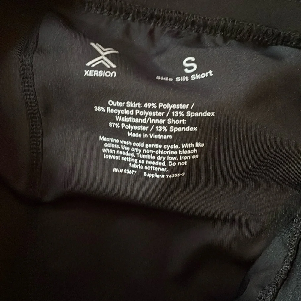 Xersion Black mini skirts and shorts